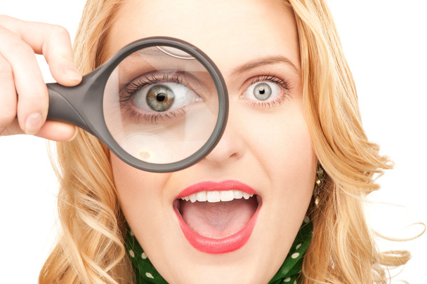Woman with magnifying glass - Foto, Bild