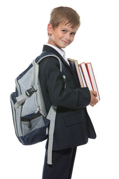 Boy holding books - Φωτογραφία, εικόνα