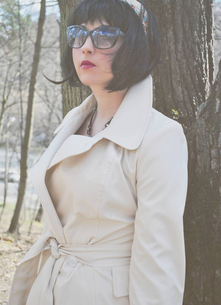 Nice plus size American woman in coat, fashionable autumn-spring style for ladies, vintage modern outfit - Photo, Image