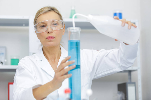 close up of a mature woman in lab - Foto, Imagem