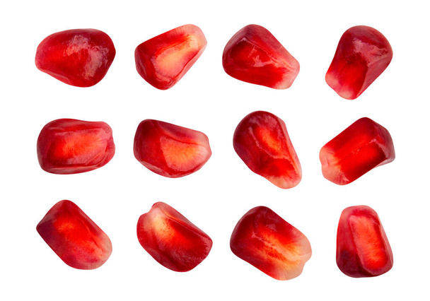pomegranate seeds path isolated on white - Fotó, kép