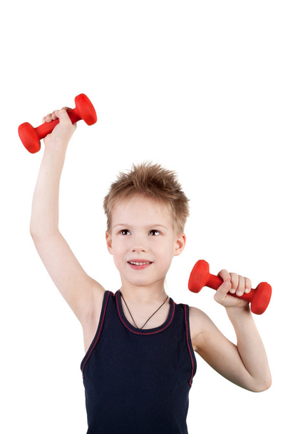 Boy training with the dumbbells - Foto, immagini