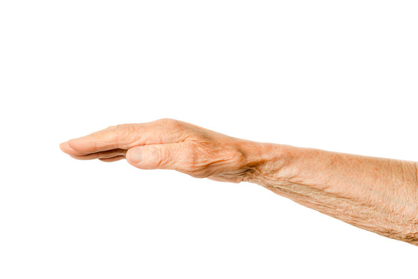 Old lady arm on a white background. Hand of elderly woman with open palm - Φωτογραφία, εικόνα
