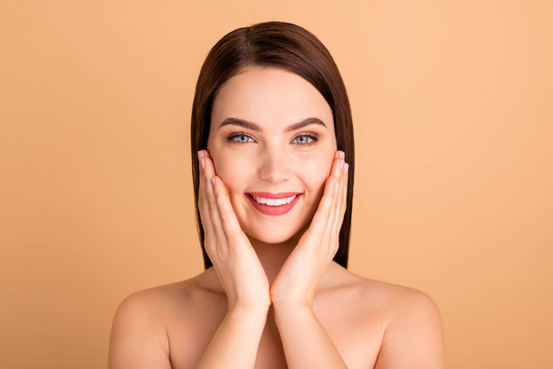 Close up photo of positive cheerful girl touch face hands enjoy new salon skincare procedure like new plastic surgery therapy make skin perfect pure isolated over pastel color background - Foto, Imagem