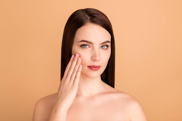 Close up photo of serious dreamy girl look mirror touch her face enjoy news skincare complexion salon treatment to become beauty queen prom isolated over beige color background - Photo, Image