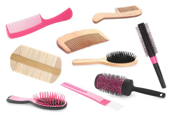 Set with different hair brushes and combs on white background - Fotoğraf, Görsel