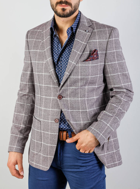 the handsome young man Patterned jacket on a white background - Photo, Image