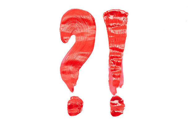 Exclamation and question mark by red paint strip isolated on white background. - Φωτογραφία, εικόνα