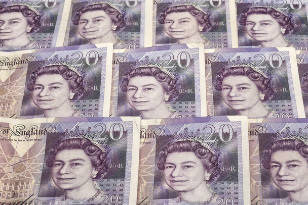 Funt brytyjski, pieniądze brytyjskiego królestwa z bliska, funt brytyjski. Tło brytyjska waluta konceptualizowana przez zbliżenie banknotów Zjednoczonego Królestwa - Zdjęcie, obraz
