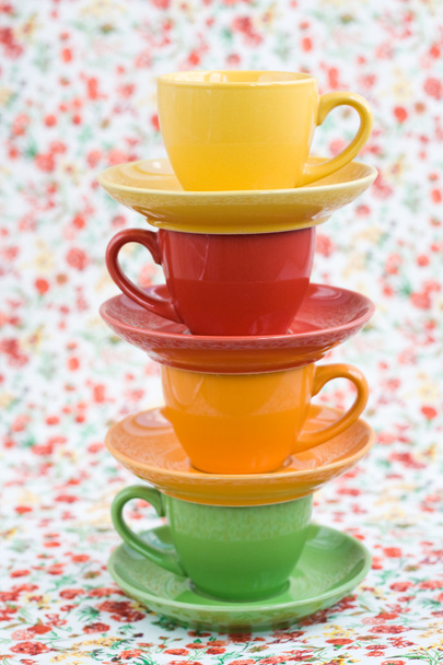 Four colorful cups on a background - Photo, Image