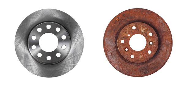 Two brake discs new and old rusty in one photo isolated on white backgroun - Photo, Image