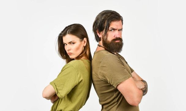 misunderstanding of couple in love. beauty of hair. brutal casual fashion. hipster male with sexy girl. young trendy couple feel sad. man and woman stand back to back. love relationship crisis - Φωτογραφία, εικόνα
