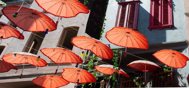 Rows Umbrellas floating above the street protecting from Sunlight - Photo, Image