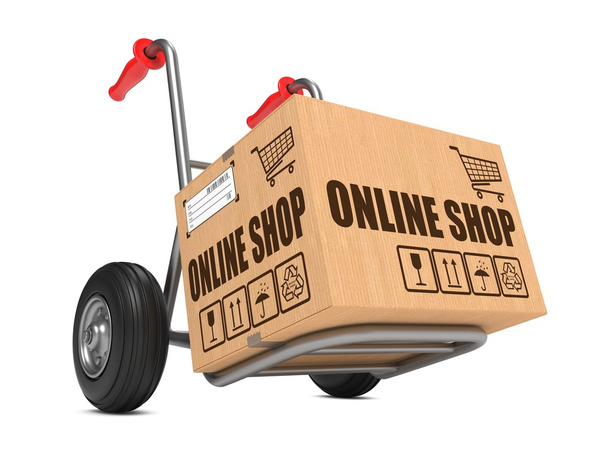 Online-shop - kartonnen doos op hand vrachtwagen. - Foto, afbeelding