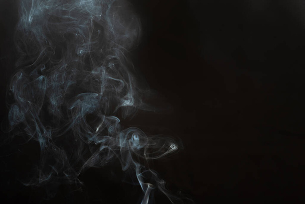 White smoke isolated on black background. smoke stock image. - Fotoğraf, Görsel