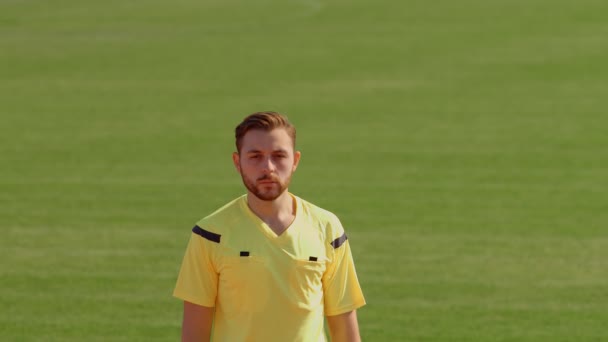 Football Soccer referee shows penalty red card, 75fps - Video, Çekim