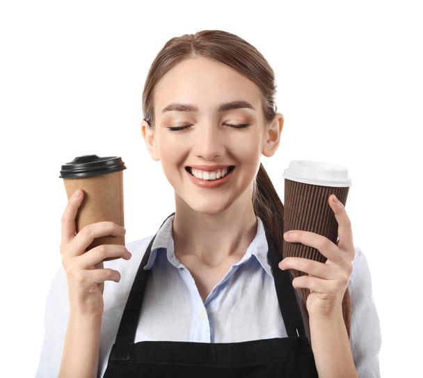 Young female barista on white background - Фото, изображение