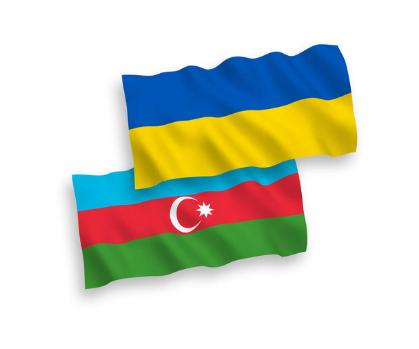 Drapeaux d'onde de tissu vectoriel national de l'Azerbaïdjan et de l'Ukraine isolés sur fond blanc. 1 à 2 proportion. - Vecteur, image