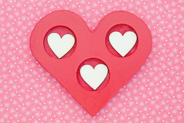 Herzen auf rosa und gemustertem Hintergrund - Foto, Bild