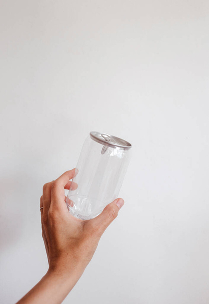 clean transparent can in the hand - Photo, Image