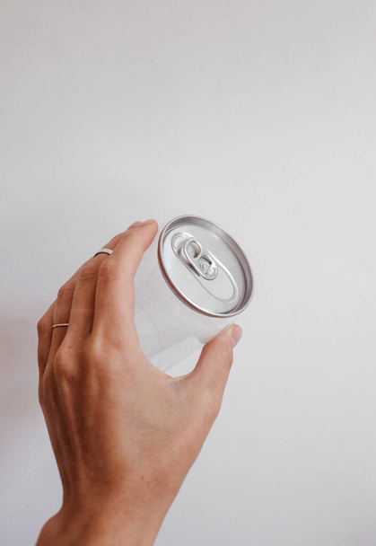 clean transparent can in the hand - Photo, image