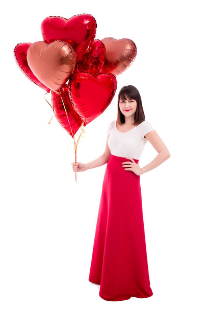 valentine's day or birthday concept - full length portrait of woman with red balloons isolated on white background - Photo, image