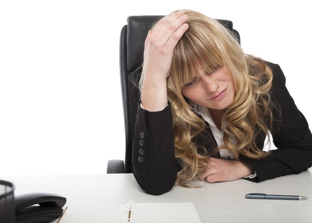 Worried businesswoman sitting thinking - Photo, Image