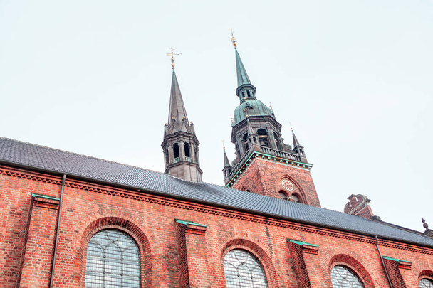 Church of the Holy Spirit in Copenhagen . Spire view of catholic Cathedral . Place of worship in Denmark  - Foto, Imagen
