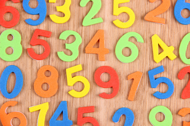 Colorful numbers on wooden background - Fotografie, Obrázek