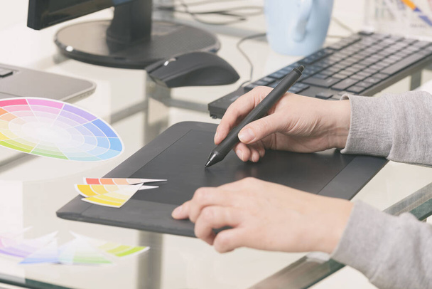 Designer using graphics tablet in the office - Photo, Image