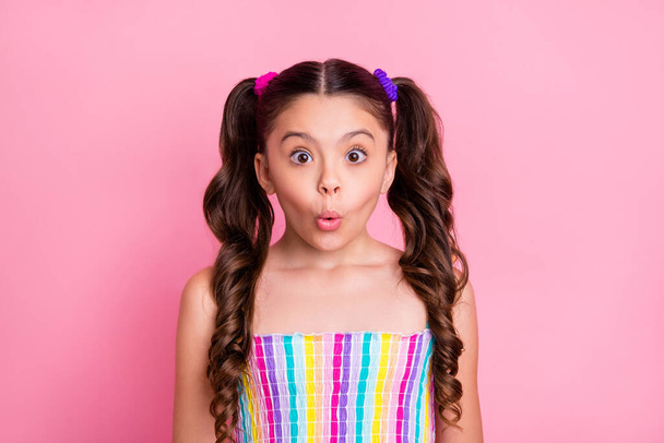 Photo of beautiful little lady two lovely cute curly tails good mood open mouth listen good news wear casual colored rainbow dress summer singlet isolated pastel pink color background - Φωτογραφία, εικόνα