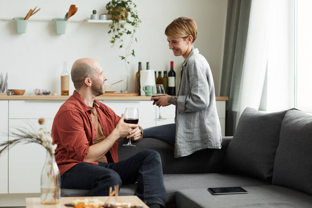 Couple drinking wine at home - Photo, Image