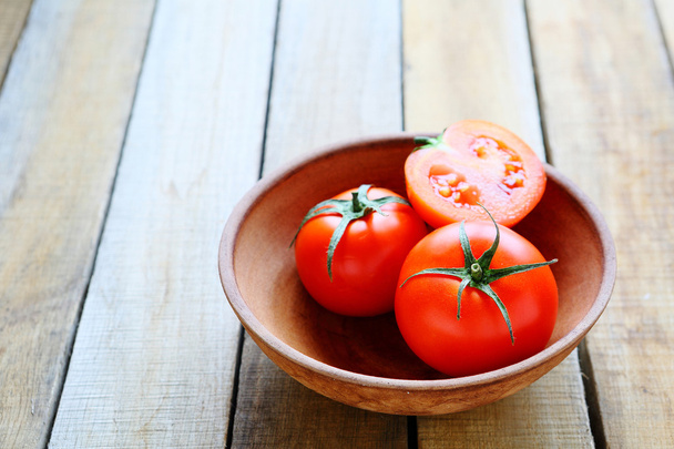 ripe red tomatoes in a bowl - Фото, зображення