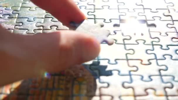 Decision making concept. Finding a solution. Hand matching jigsaw pieces. Jigsaw puzzle assembling. Complex project management. - Footage, Video