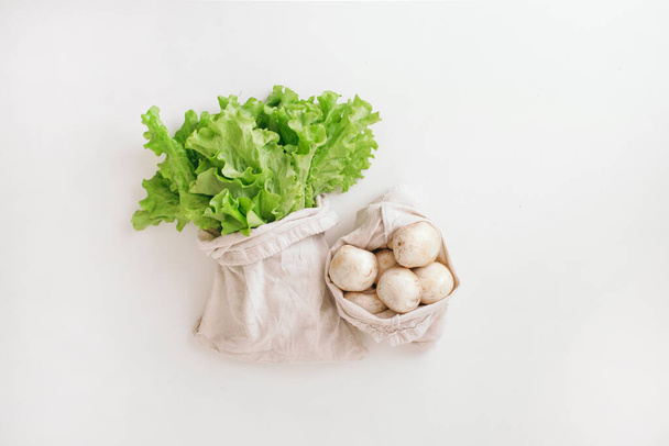 the salad and mushrooms in zero waste bags - Fotoğraf, Görsel