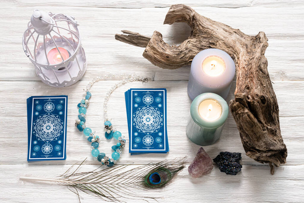 Blue tarot cards on white wooden table background. - Foto, Imagem