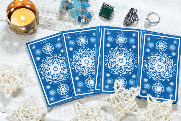 Tarot cards on white wooden table. - Foto, Imagem