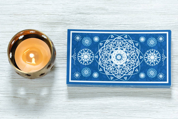 Tarot cards on white wooden table. - Foto, Imagen