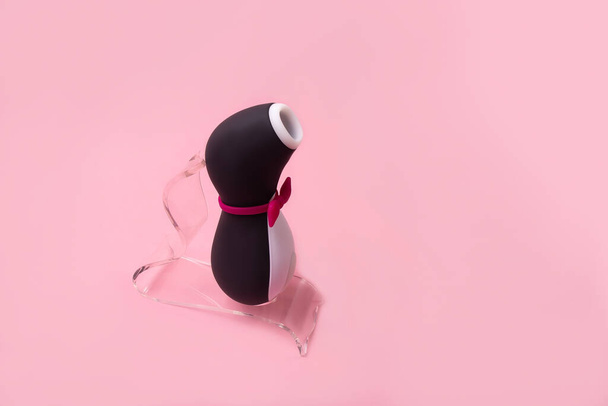 on a pink background sex product, a toy for adults - Foto, Imagen