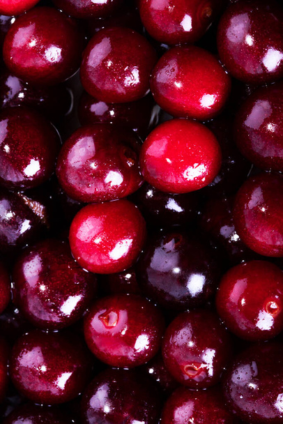 Sweet cherry background. Tasty bright background with cherry. - Photo, image