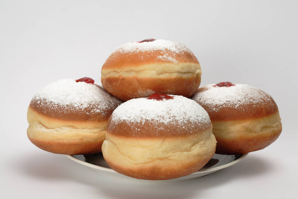 Donuts for the jewish holiday of Hanukkah, isolated - Foto, afbeelding