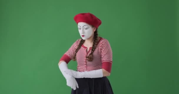 Confused mime artist checking pockets finding loss of her stuff  - Footage, Video
