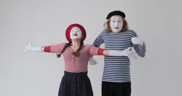 Two mime artists celebrating success - Footage, Video