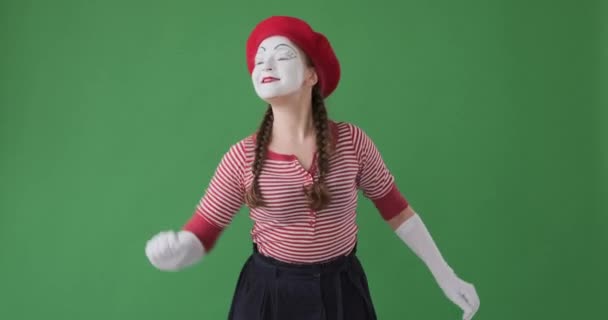 Mime artist greeting and showing heartfelt gratitude towards her fans from the stage - Footage, Video