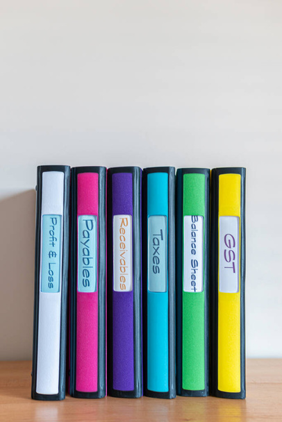 Set of color coded files and binders used by bookkeeper and accountant - Photo, Image