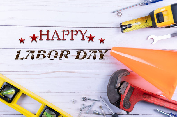 Happy Labor day. Construction tools on wooden background. Labor day concept. Copy space. - Photo, Image