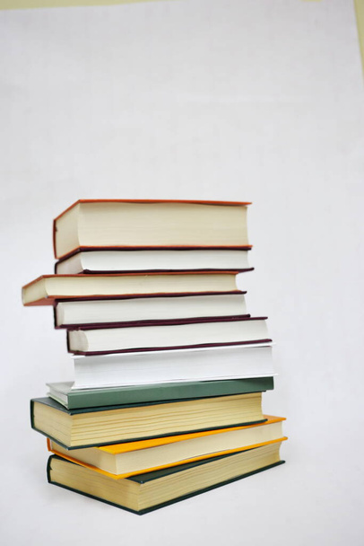 Stack of books on white background - Φωτογραφία, εικόνα
