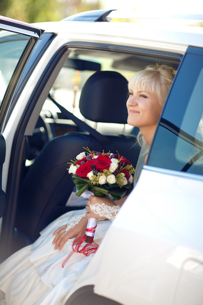 bride in the car - 写真・画像