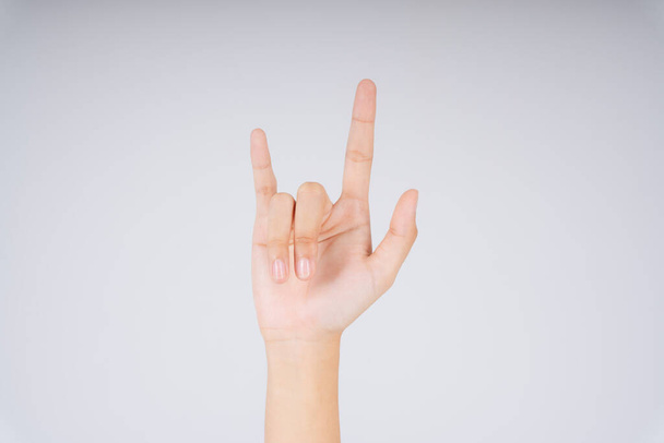 I love you hand sign isolate over white background. - Foto, imagen