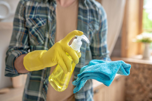 Close up picture of mans hands spraying desinfector - Foto, Imagem